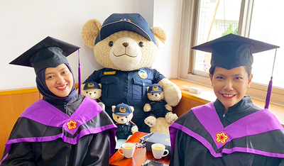 International Graduates with Taiwan Police Mascot